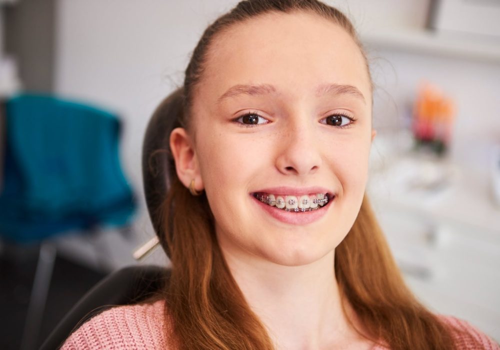 portrait-smiling-child-with-braces-dentist-s-office.jpg